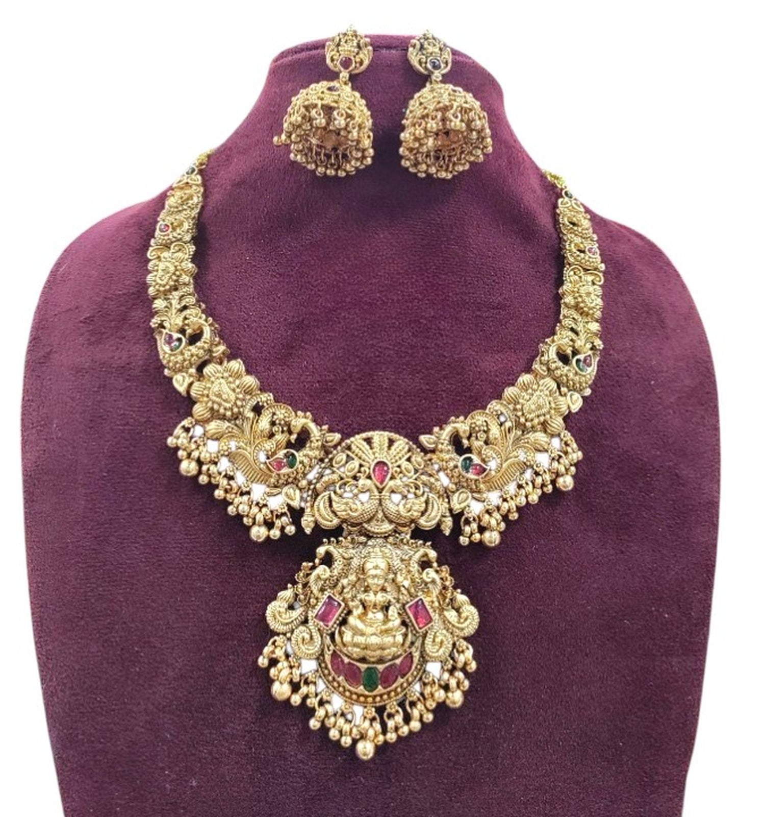 Jewel City Gold Lakshmi Temple Necklace Set - Bridal Jewelry with Ruby and Emerald Accents | Swadesiicart