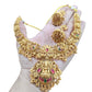 Jewel City Gold Lakshmi Temple Necklace Set - Bridal Jewelry with Ruby and Emerald Accents | Swadesiicart