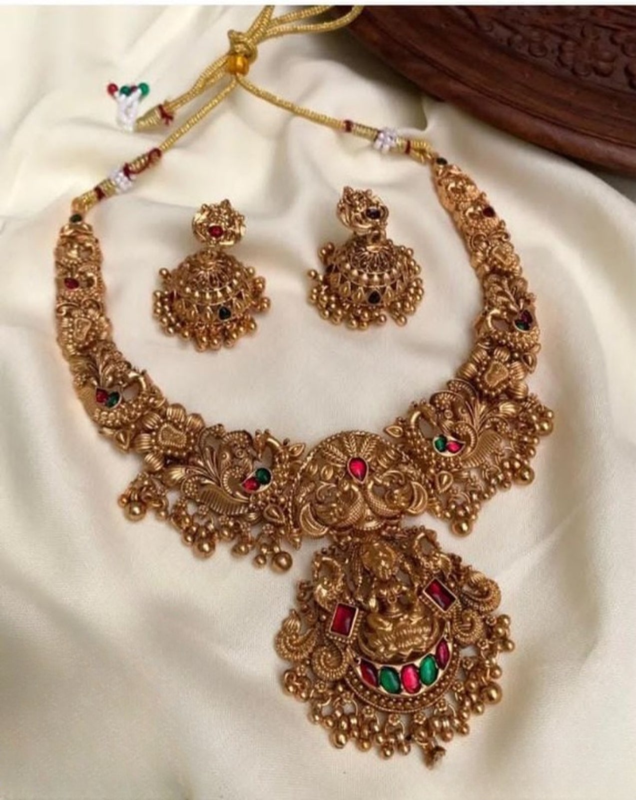 Jewel City Gold Lakshmi Temple Necklace Set - Bridal Jewelry with Ruby and Emerald Accents | Swadesiicart