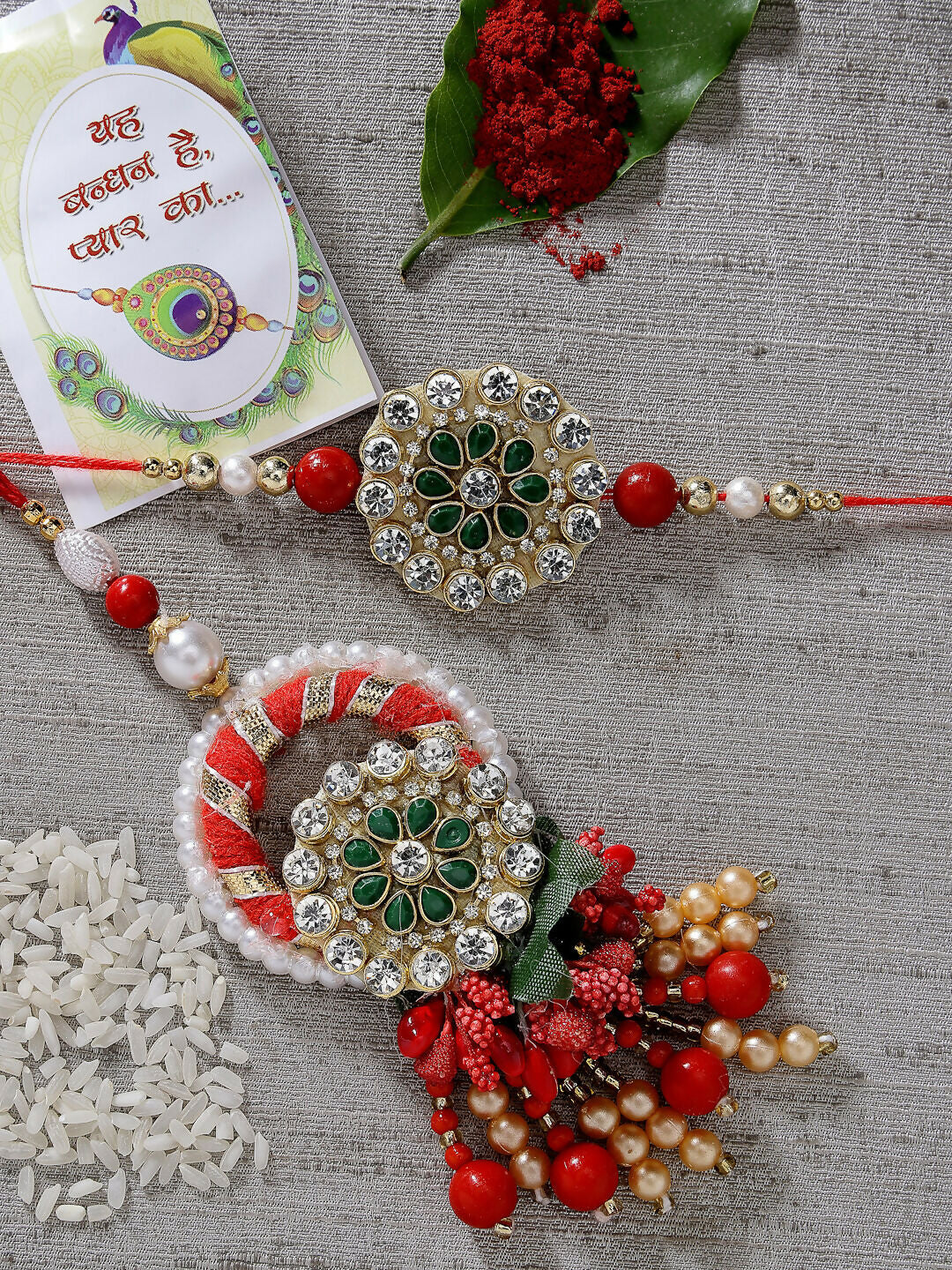 NVR Women & Men Set of 2 Red & Gold Toned Stone-Studded & Beaded Bhaiya Bhabhi Rakhi With Roli Chawal & Chocolate | Swadesiicart
