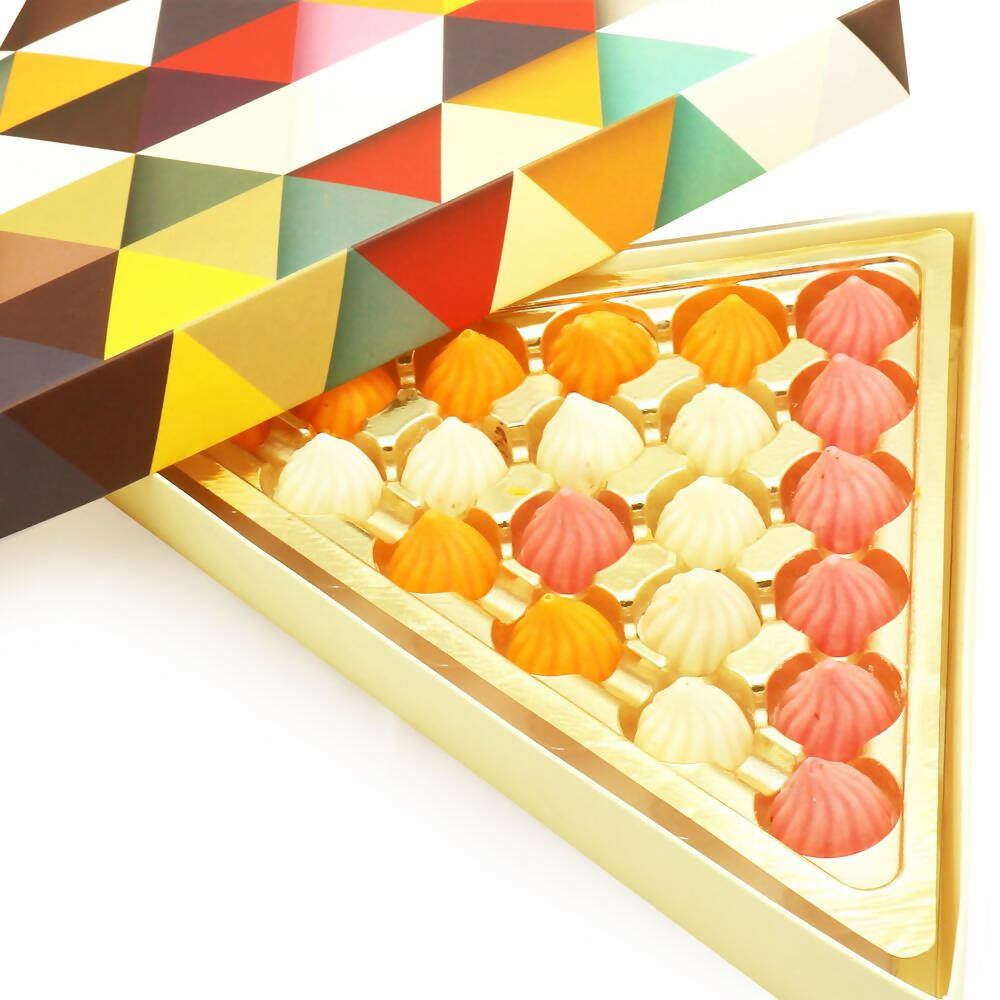 Ghasitaram Triangle Mango, Strawberry and White Chocolate Modaks | Swadesiicart
