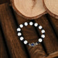 NVR Women & Men Black & White Evil Eye Elasticated Rakhi With Roli Chawal - Swadesiicart