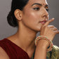 Gold-Polished Green Stone-Studded Beaded Meenakari Bangle - Ruby Raang - Ruby Raang Studio