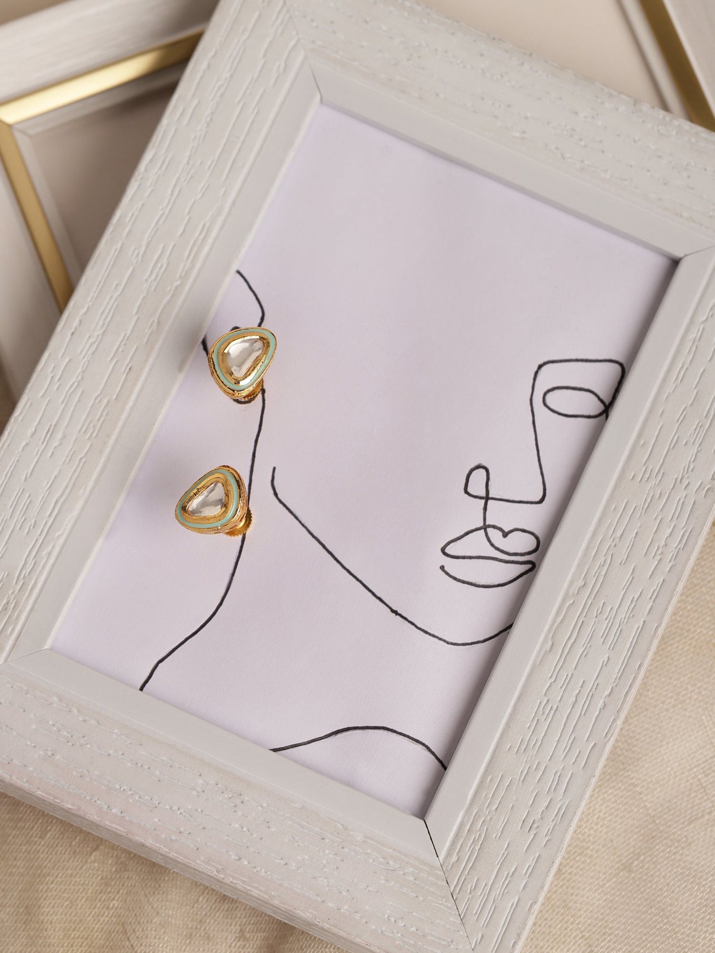 Gold-Polished Triangular Kundan Studded Studs Earrings - Ruby Raang - Ruby Raang Studio