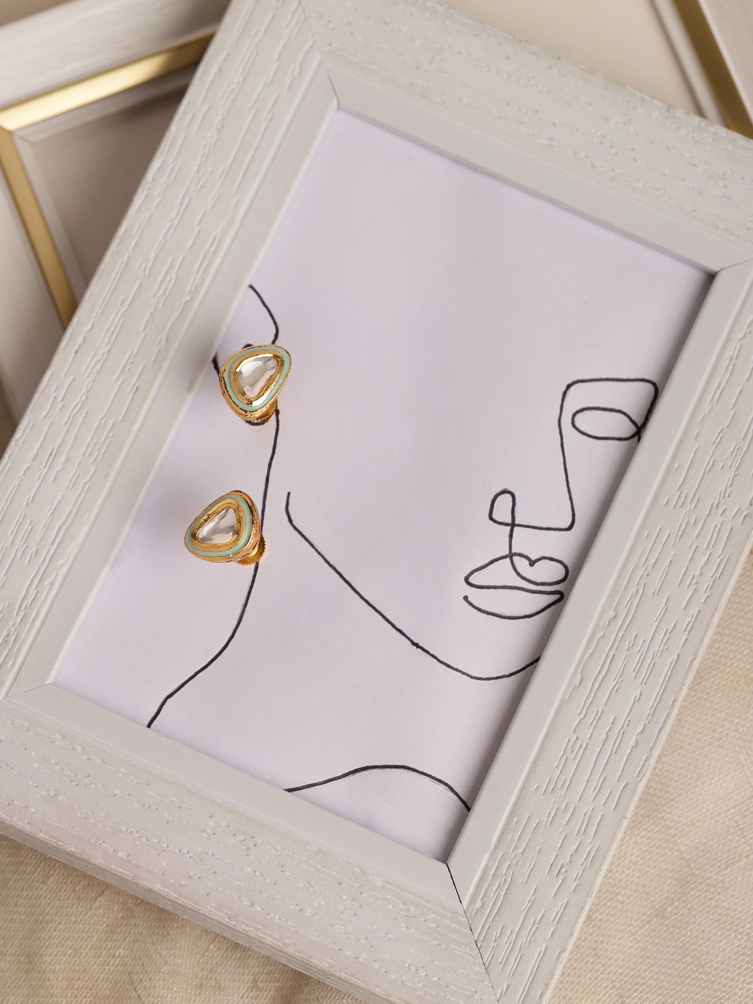 Gold-Polished Triangular Kundan Studded Studs Earrings - Ruby Raang - Ruby Raang Studio