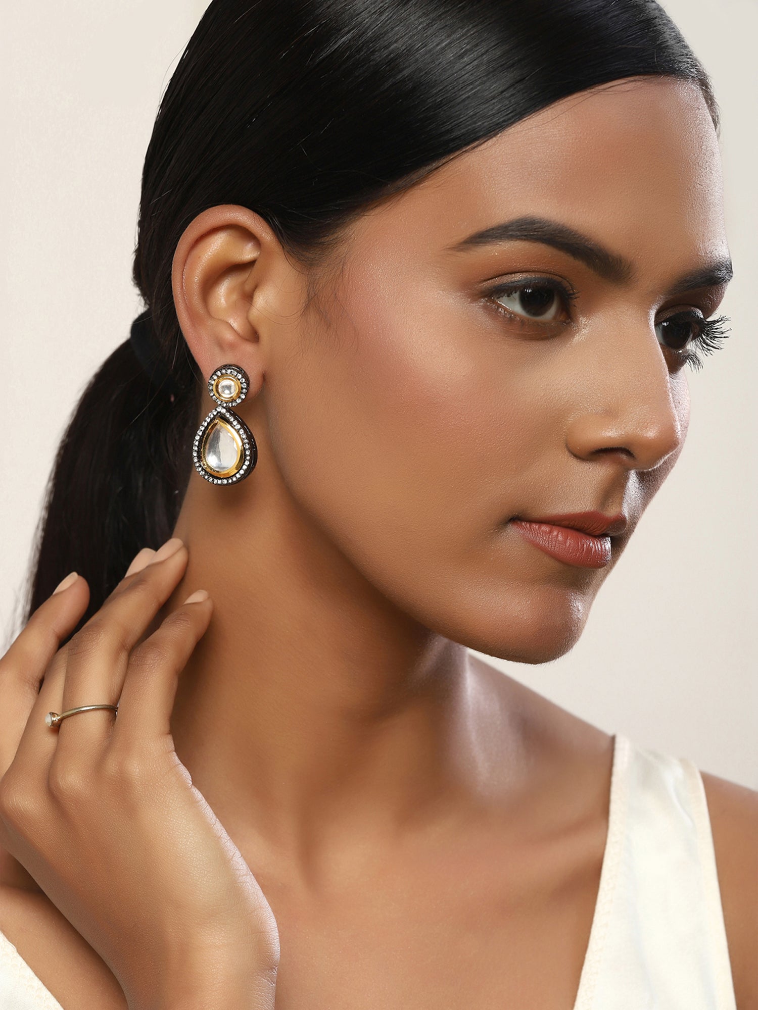 Silver-Plated Teardrop Shape Kundan Studded Drop Earrings - Ruby Raang - Swadesiicart