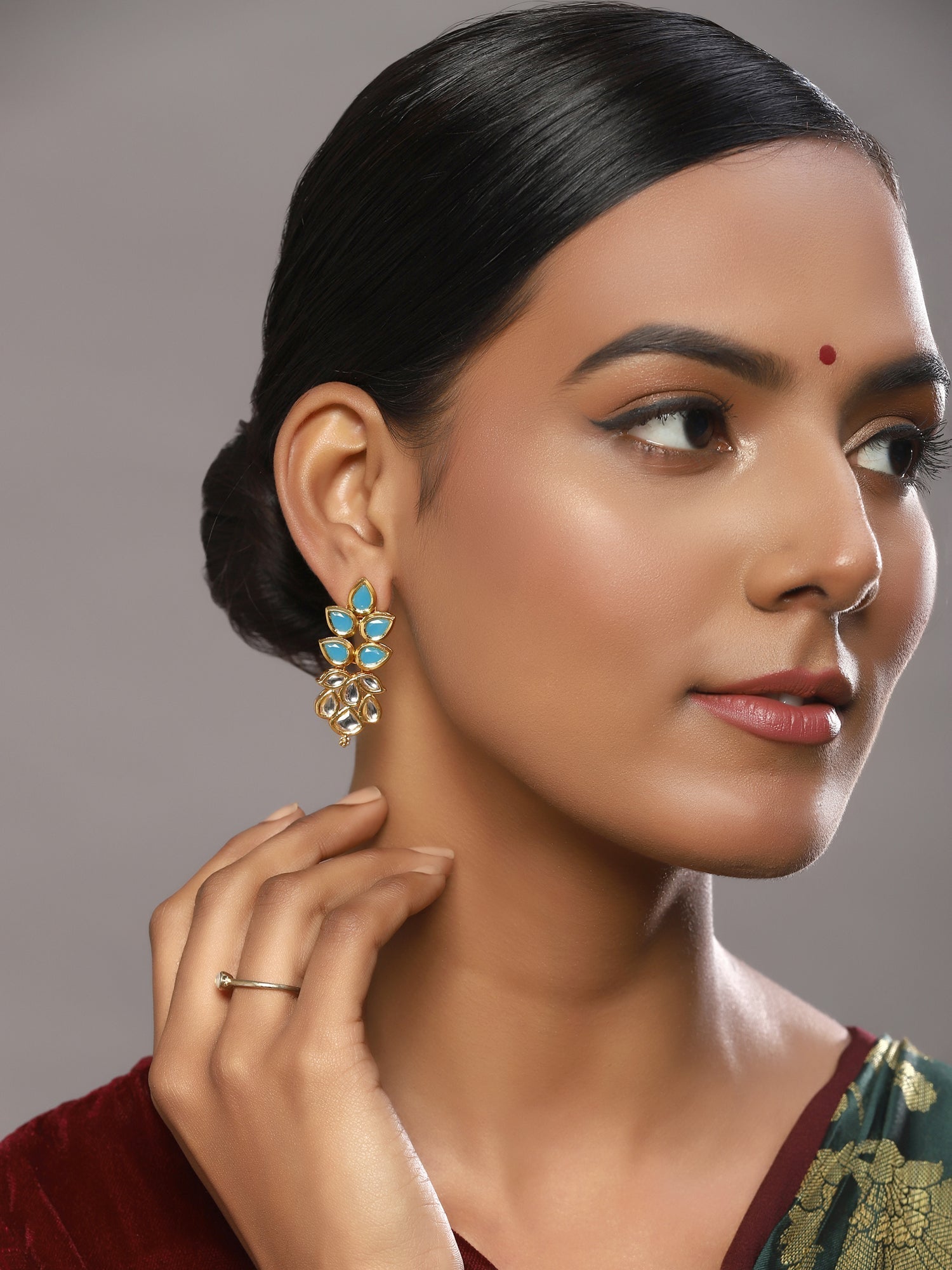 Gold-Toned Leaf Shaped Studs Earrings - Ruby Raang - Swadesiicart