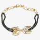 Black Gold-Toned Kundan Bracelet Mangalsutra - Ruby Raang