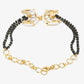 Black Gold-Toned Kundan Bracelet Mangalsutra - Ruby Raang