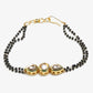 Black Gold-Toned Kundan Bracelet Mangalsutra - Ruby Raang - Swadesiicart
