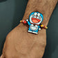 Indianvibez Doraemon Wooden Rakhi with Rudraksha, Cartoon Rakhi for Bro, Shop India - Kids Rakhi - Swadesiicart