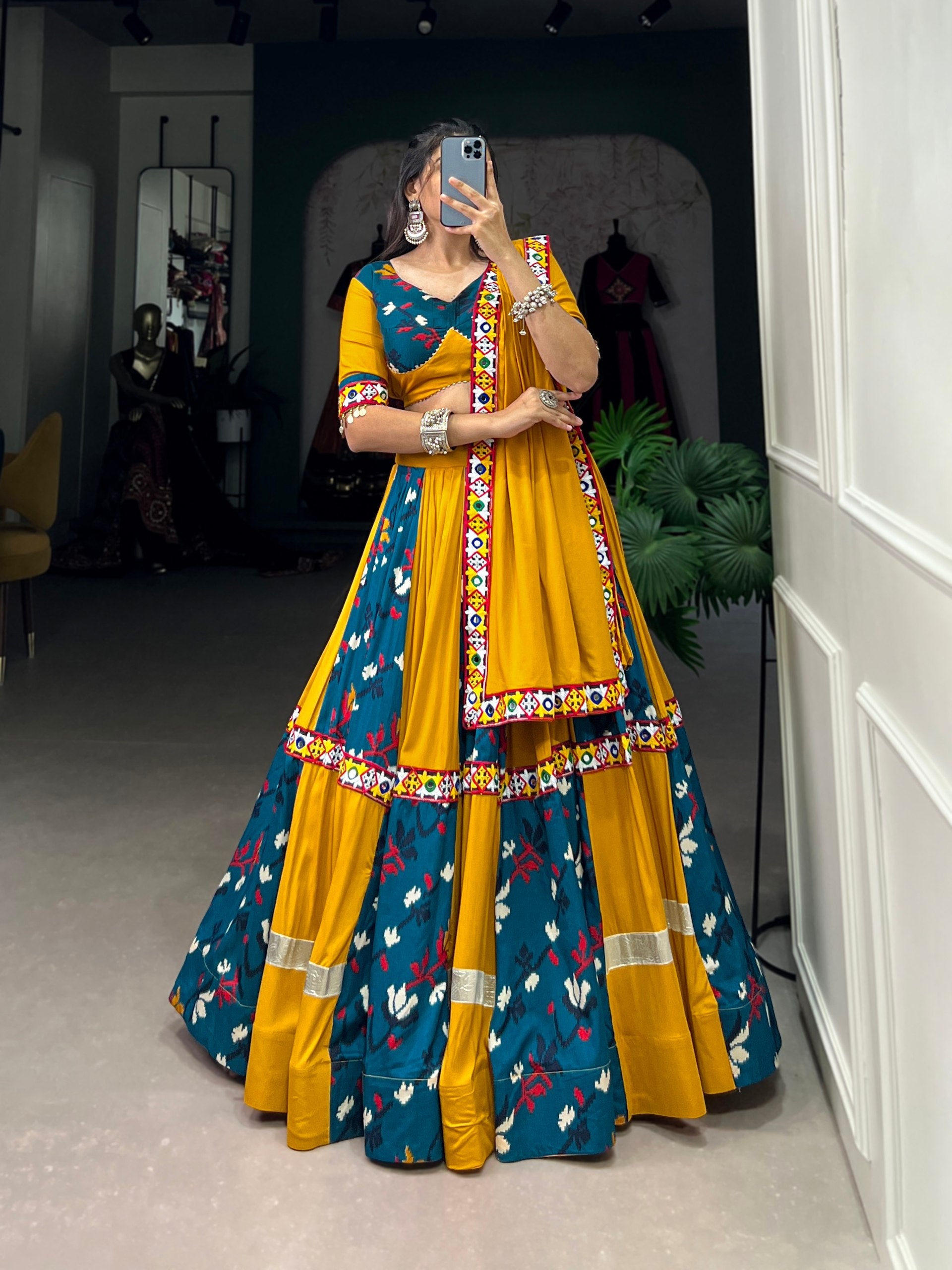 Lorenvalley Yellow and Rama Rayon with Printed Silk Original Mirror Gamthi Work and Embossed Design Gota Lehenga Choli with Dupatta | Swadesiicart