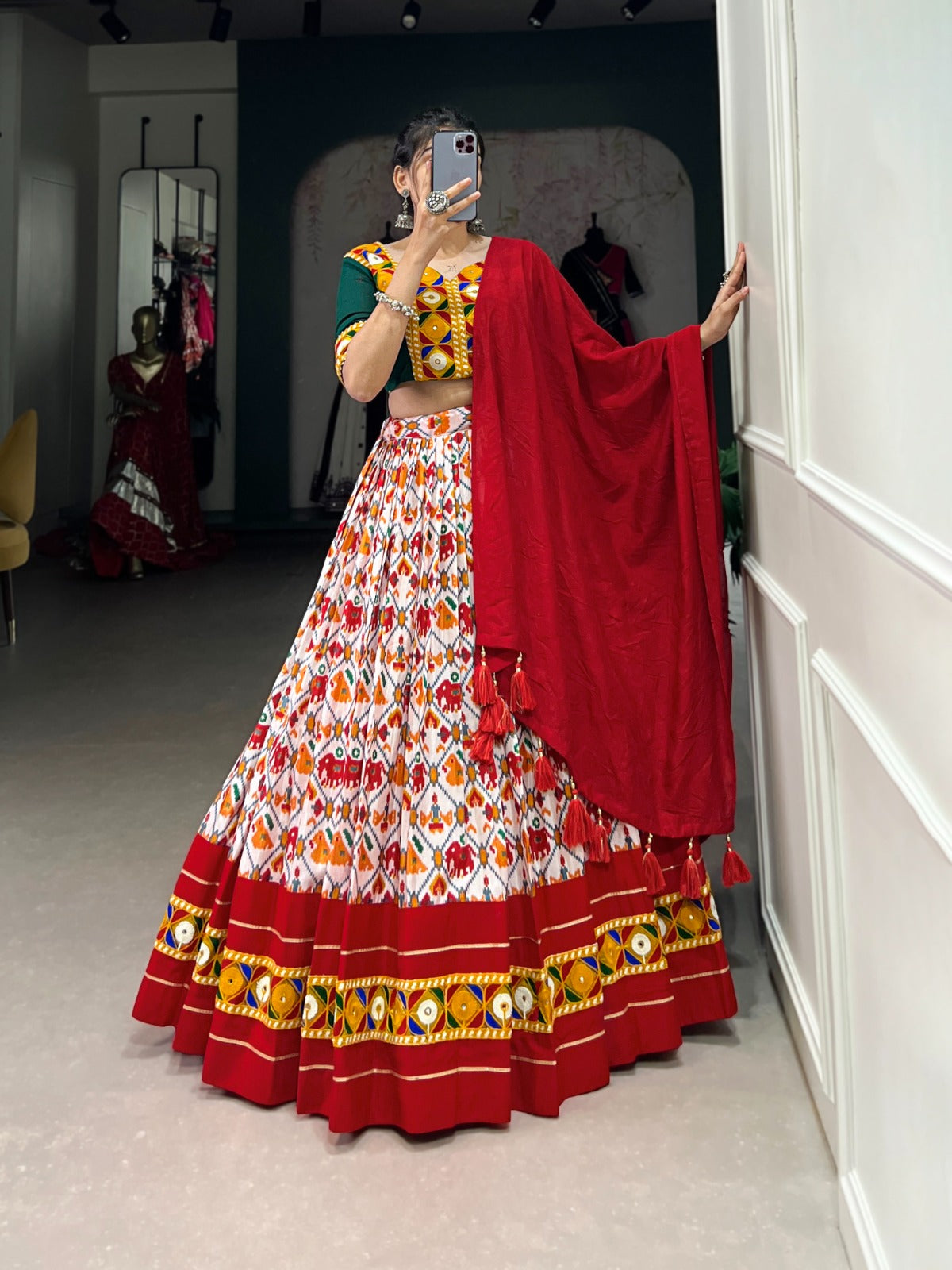 Lorenvalley Red Dola Silk and Cotton with Patola Print With Foil Work And Original Mirror Gamthi Lace Lehenga Choli | Swadesiicart