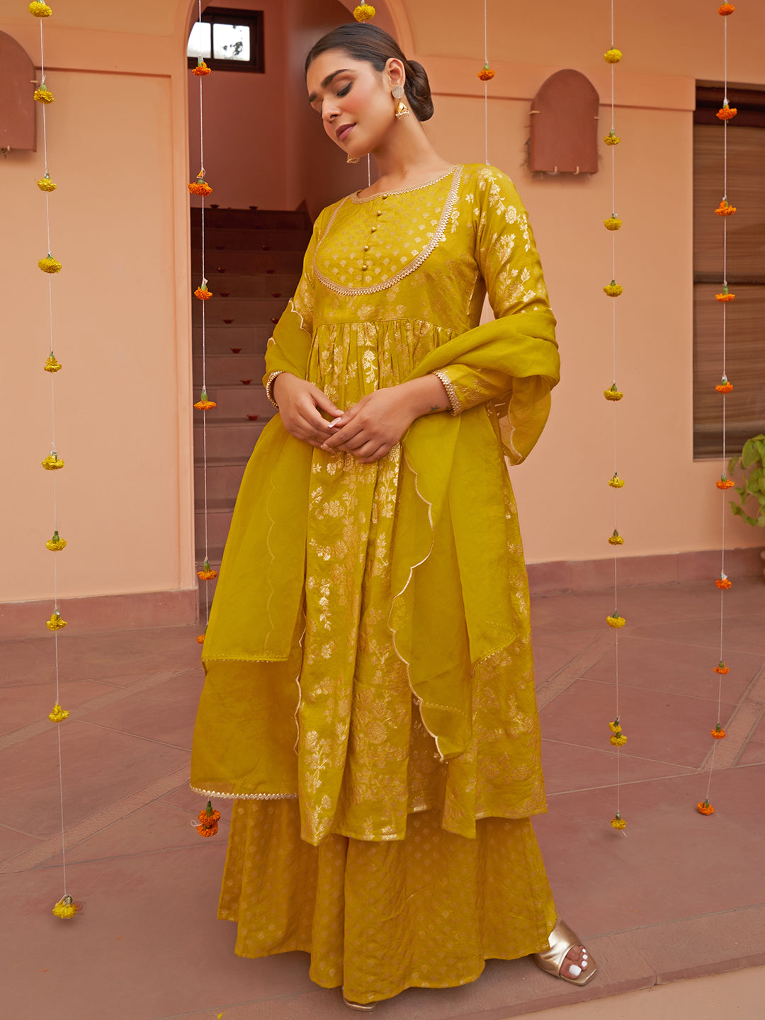 Janasya Women's Yellow Brocade Woven Design Festive Flared Kurta Set | Swadesiicart