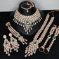 Jewel City Emerald Green Bridal Jewelry Set - Premium AD Choker Set with Nath, Earrings & Hand Chain - Handcrafted Wedding Collection Kundan Style | Swadesiicart