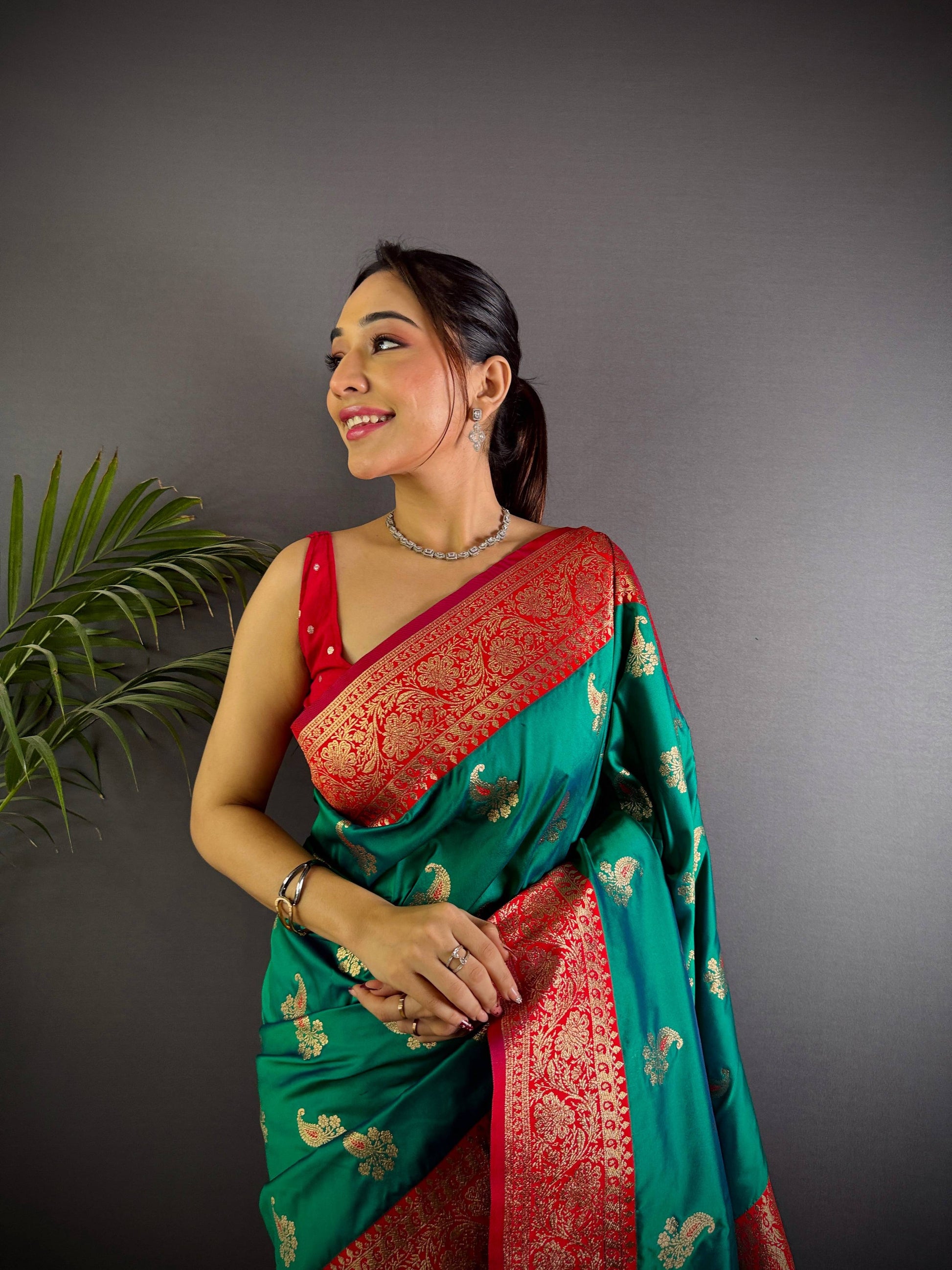 Sonakshi Women's Teal Banarasi Silk Zari Woven Traditional Saree with Blouse | Swadesiicart
