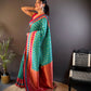 Sonakshi Women's Teal Banarasi Silk Zari Woven Traditional Saree with Blouse | Swadesiicart