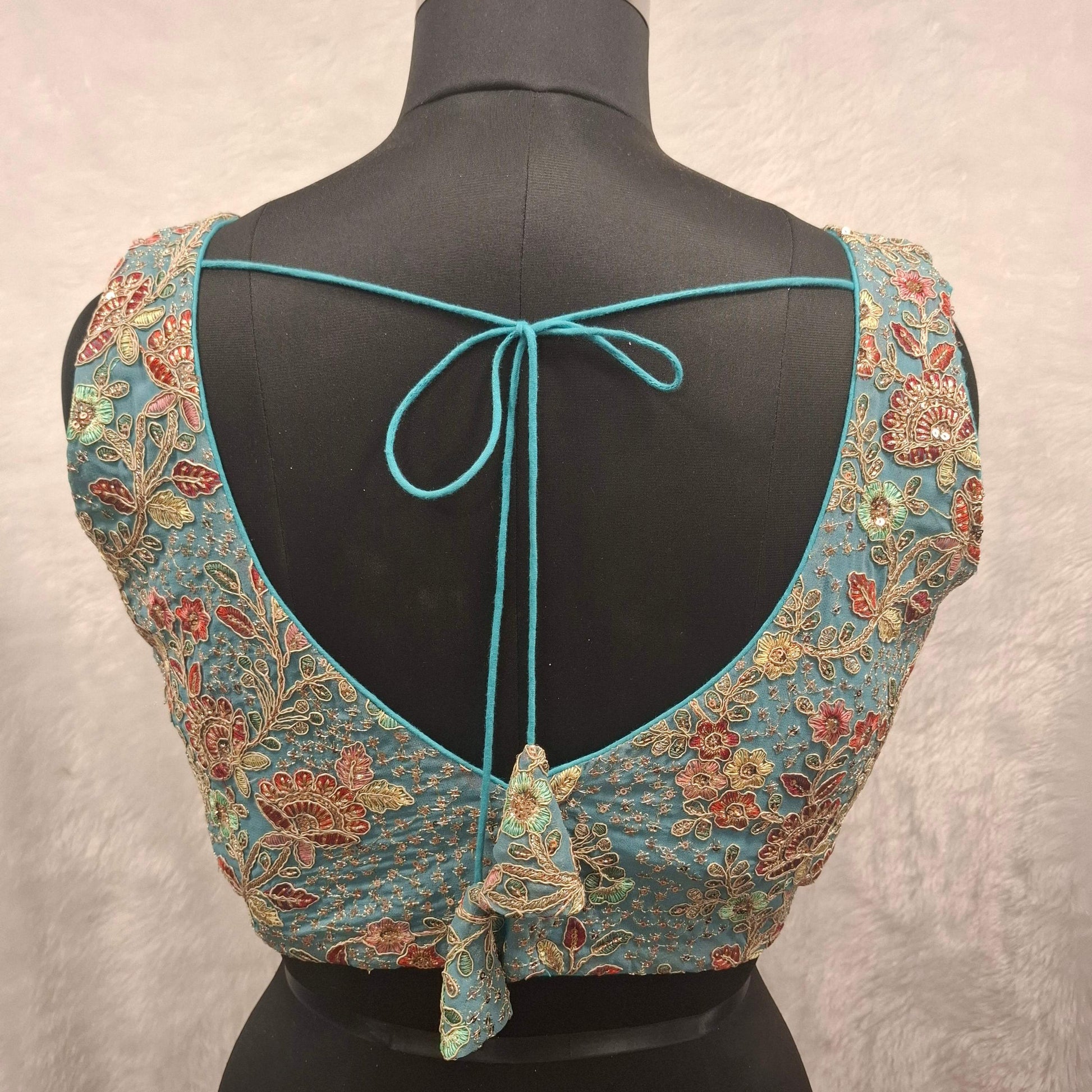 Kia Fashions Aqua Blue Georgette Multi Color Emb & Sqn Readymade Blouse - Swadesiicart