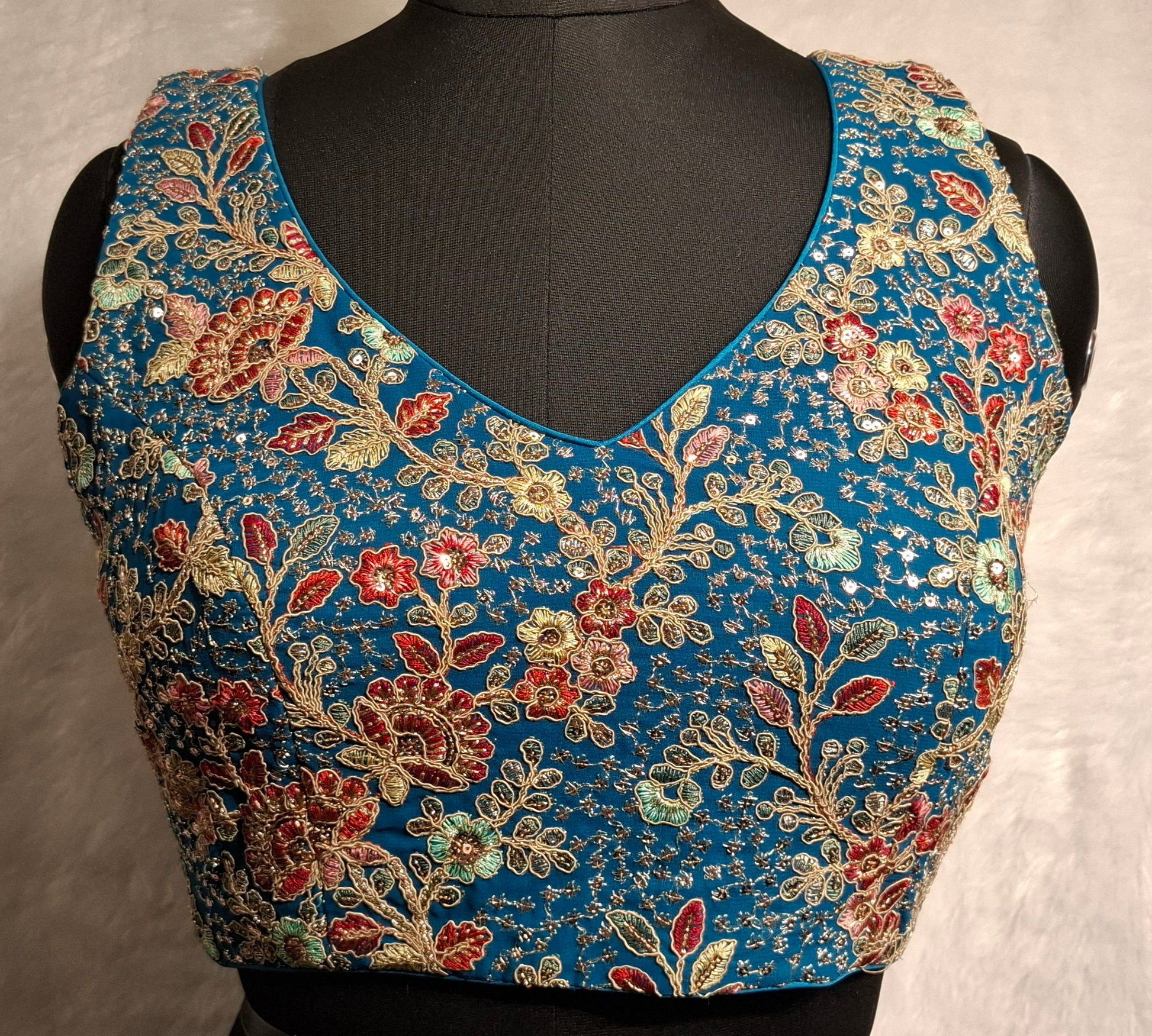 Kia Fashions Turquoise Blue Georgette Multi Color Emb & Sqn Readymade Blouse - Swadesiicart
