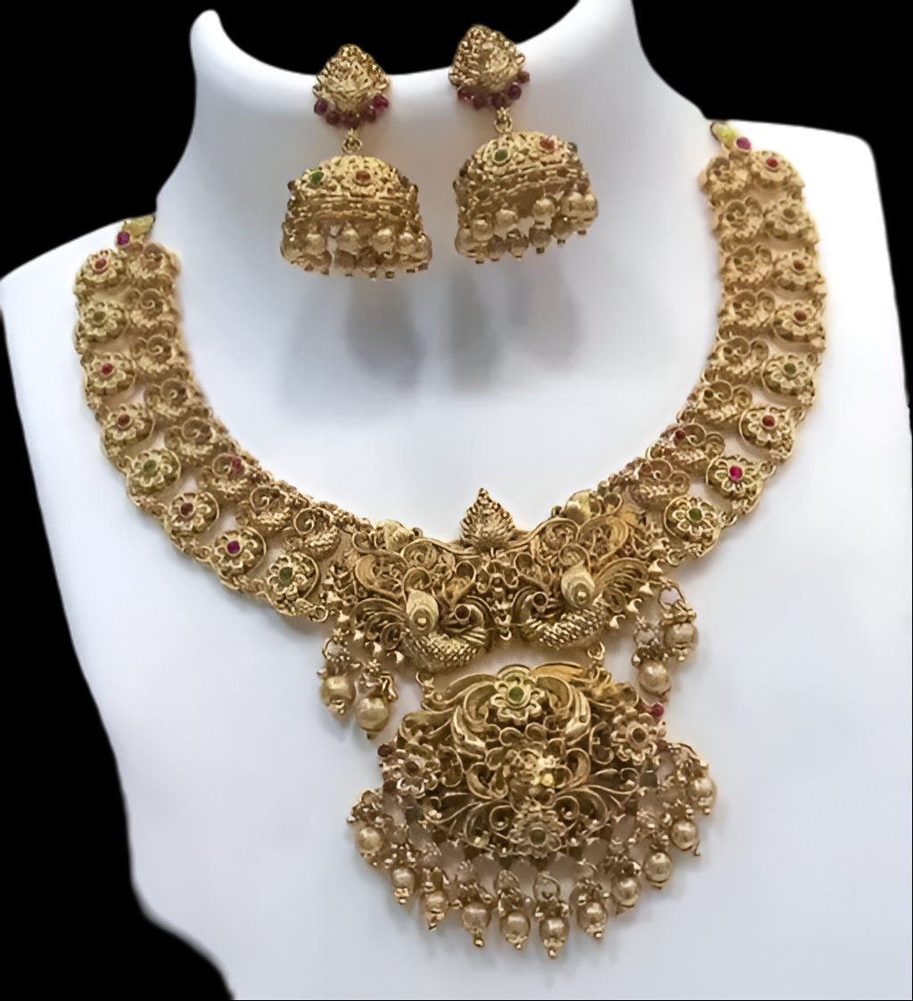 Jewel City Royal Antique Gold Peacock Motif Necklace Set with Jhumka Earrings - Premium Bridal Temple Jewelry with Ruby & Emerald Accents | Swadesiicart