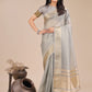 Shree Shyam Fashion Grey Organza Woven Zari Work Traditional Tassel Saree