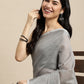 Shree Shyam Fashion Elegant Grey Woven Linen Saree with Contrast Zari Border & Tassels - Soft & Breathable Party Wear