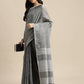 Shree Shyam Fashion Elegant Dark Grey Woven Linen Saree with Contrast Zari Border & Tassels - Soft & Breathable Party Wear