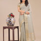 Shree Shyam Fashion Beige Organza Woven Zari Work Traditional Tassel Saree