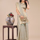 Shree Shyam Fashion Beige Organza Woven Zari Work Traditional Tassel Saree