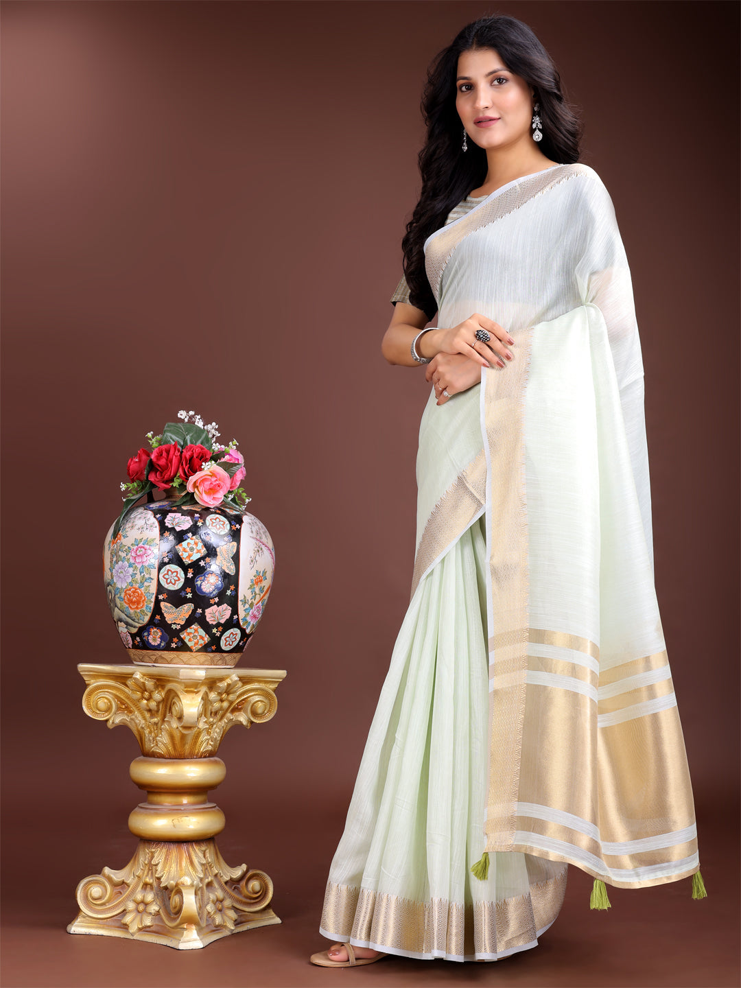 Shree Shyam Fashion Elegant Light Green Woven Linen Saree with Contrast Zari Border & Tassels - Soft & Breathable Party Wear