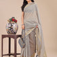 Shree Shyam Fashion Grey Organza Woven Zari Work Traditional Tassel Saree