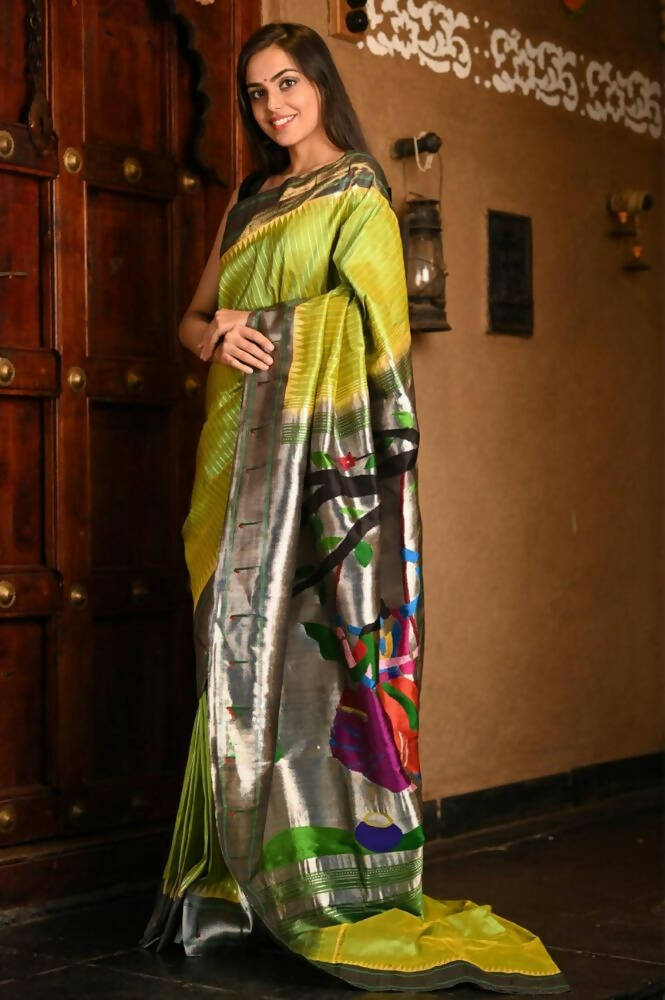 Very Much Indian Premium Handloom Pure Silk Muniya Borde-Parrot Green,Silver Zari And Intricate Big Radha Krishna Pallu | Swadesiicart