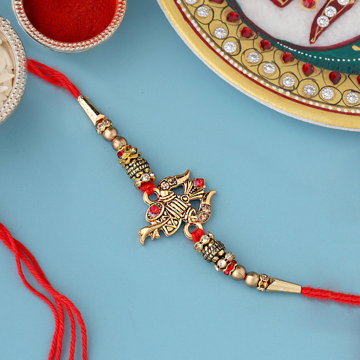 trueBrowns X Voylla Designer Ganesha Rakhi With Roli Chaawal Pack | Swadesiicart