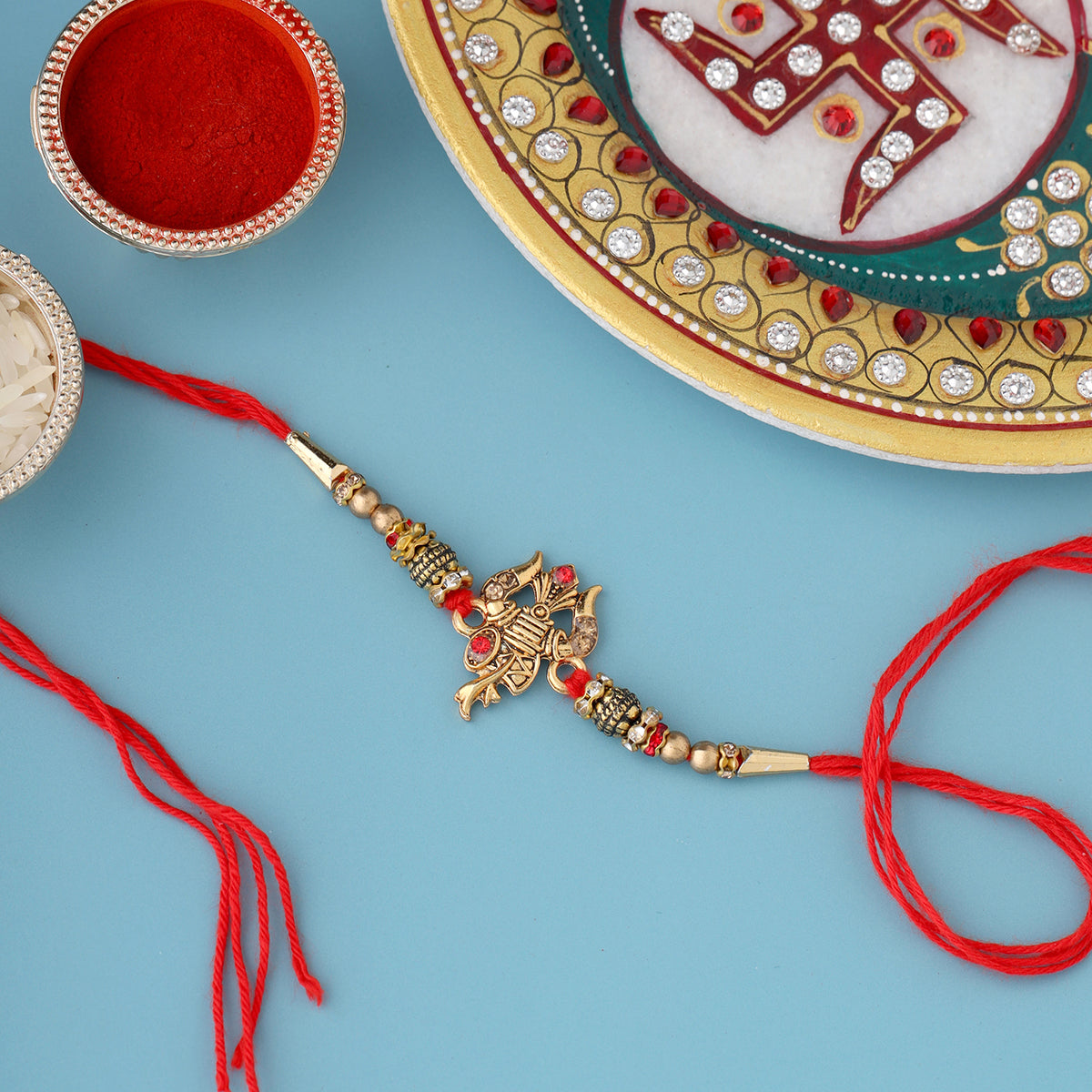trueBrowns X Voylla Designer Ganesha Rakhi With Roli Chaawal Pack | Swadesiicart