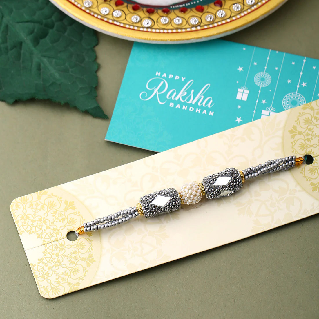 trueBrowns X Voylla Silver Beaded Rakhi With Roli Chaawal Pack | Swadesiicart