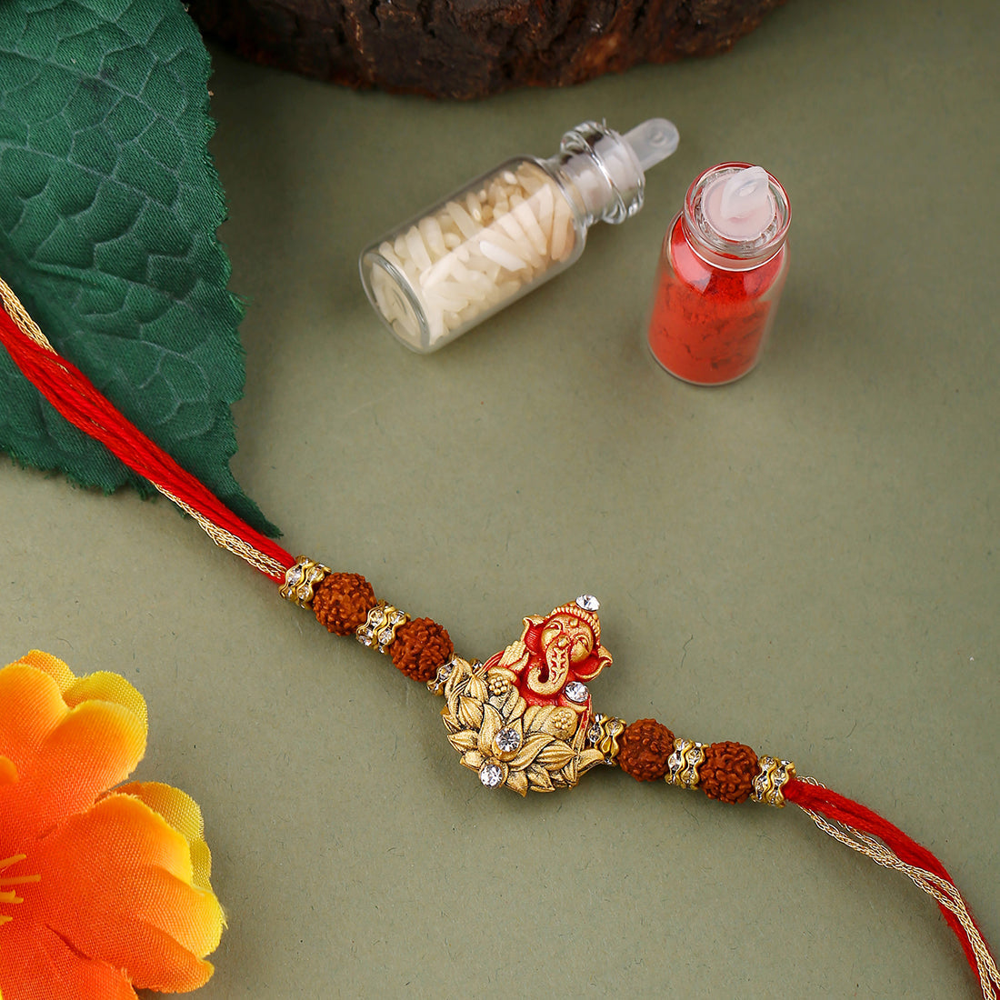 trueBrowns X Voylla Divine Rudraksha Ganesha Rakhi With Roli Chaawal Pack | Swadesiicart