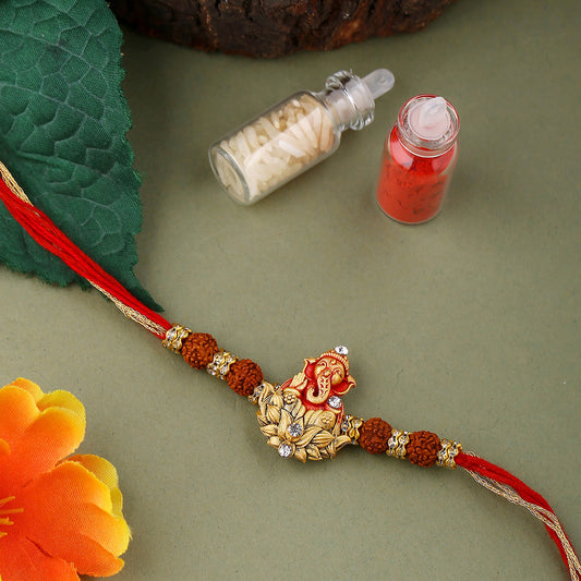 trueBrowns X Voylla Divine Rudraksha Ganesha Rakhi With Roli Chaawal Pack | Swadesiicart