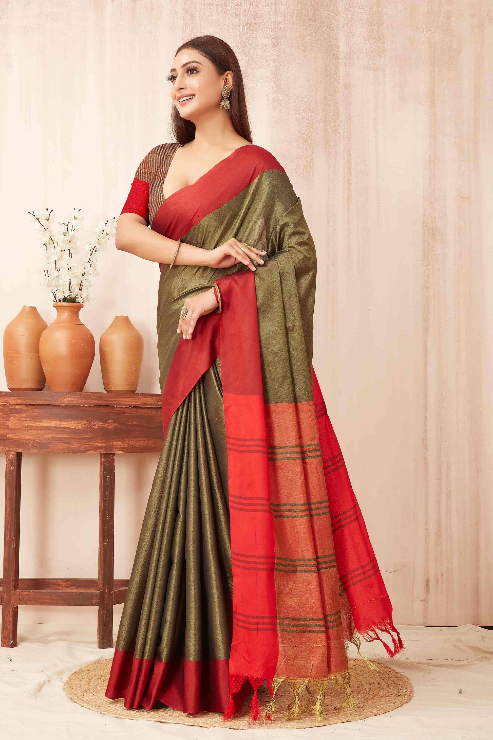 Hiral Fashion Olive Banarasi Soft Silk Solid Saree | Swadesiicart