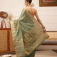 Hiral Fashion Teal Kanjivaram Tissue Silk Floral Zari Woven Saree | Swadesiicart
