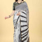 Black Cotton Blend Printed Striped Saree with Unstitched Blouse - Hiral Fashion | Swadesiicart