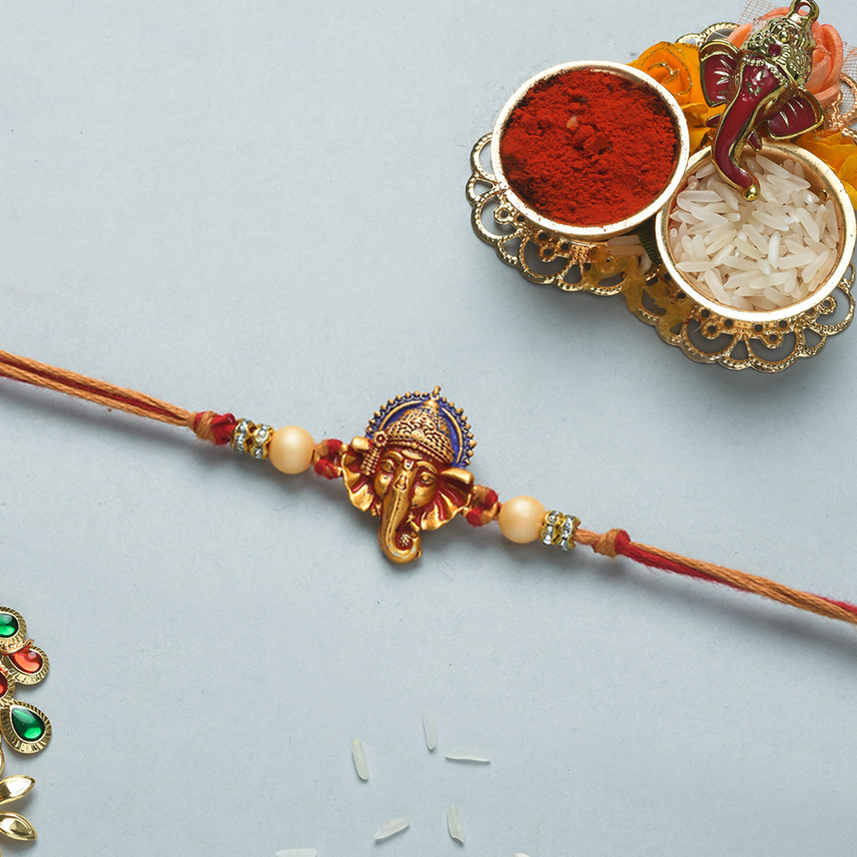 trueBrowns X Voylla Deity Inspired CZ Embellished Ganpati Rakhi | Swadesiicart