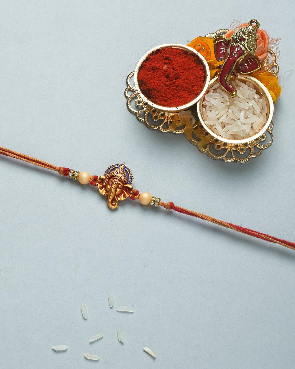 trueBrowns X Voylla Deity Inspired CZ Embellished Ganpati Rakhi | Swadesiicart