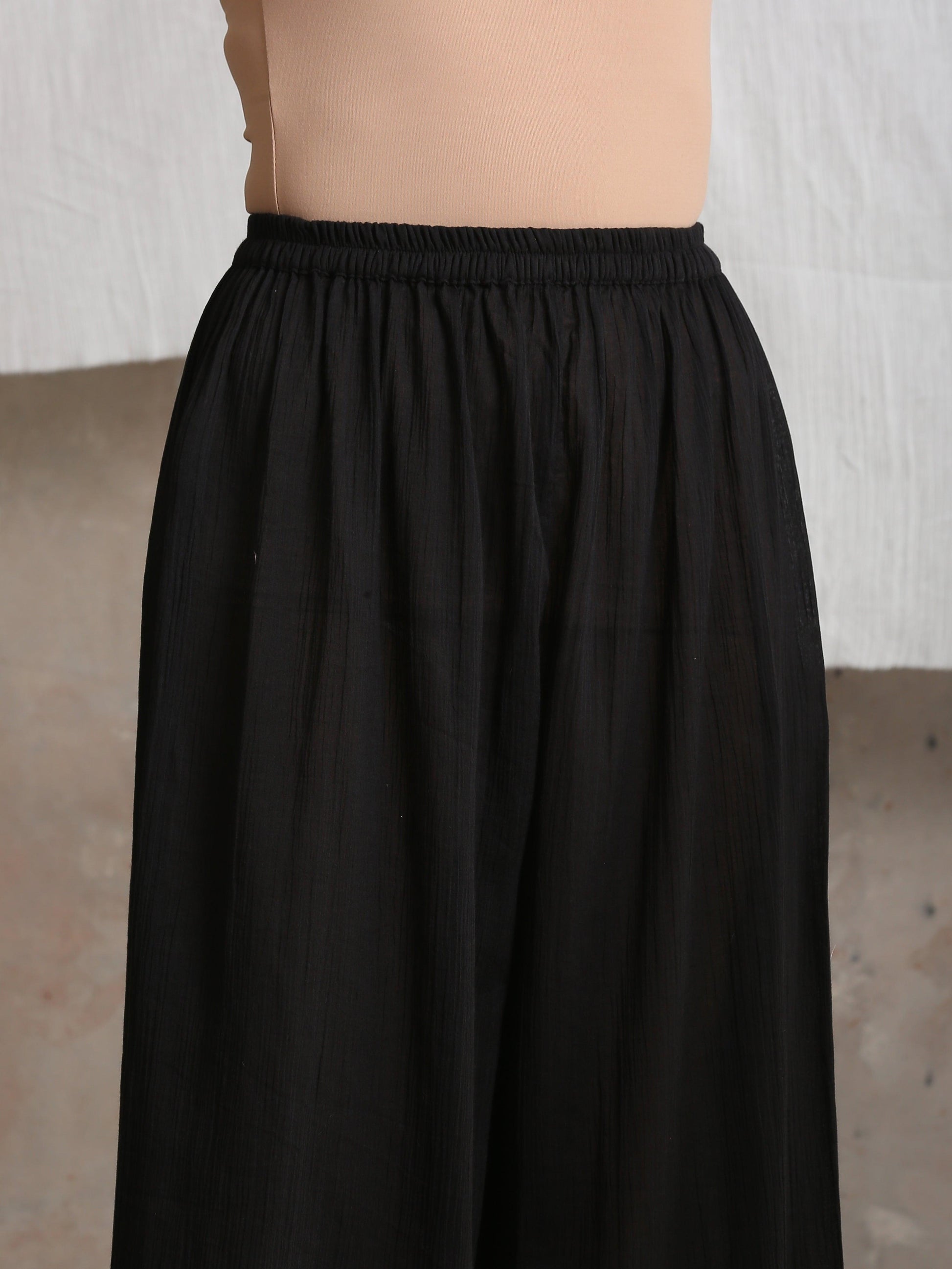 trueBrowns Crinkle Palazzo - Black | Swadesiicart