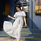 Off white Rayon Foil Printed Long Dress - Michan | Swadesiicart