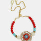 NVR Women & Men Set of 2 Red-colored Stone-Studded & Beaded Bhaiya Bhabhi Rakhi With Roli Chawal & Chocolate | Swadesiicart