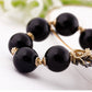 Gold-Polished Alloy Classy Beaded Charm Bracelet - The Pari - Swadesiicart
