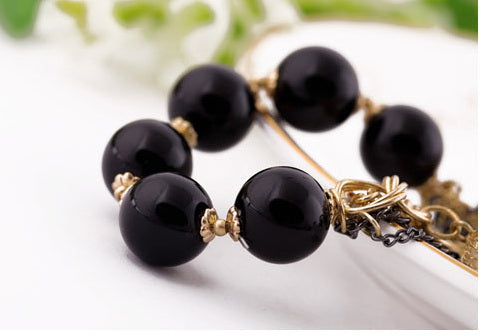 Gold-Polished Alloy Classy Beaded Charm Bracelet - The Pari - Swadesiicart