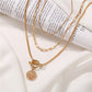 Gold-Polished Alloy Layered Designer Short Necklace - The Pari | Swadesiicart