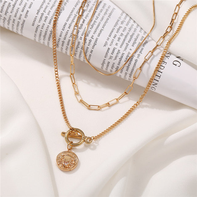 Gold-Polished Alloy Layered Designer Short Necklace - The Pari | Swadesiicart
