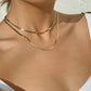 Gold-Polished Alloy Layered Designer Short Necklace - The Pari | Swadesiicart